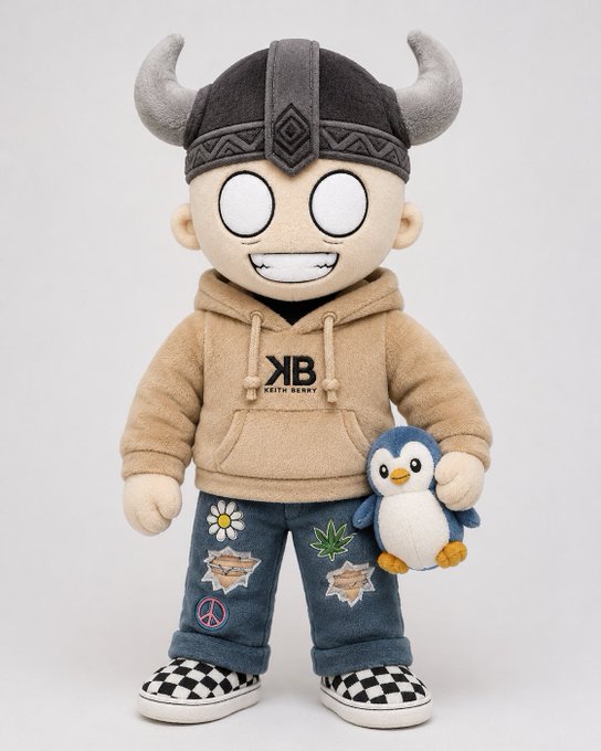A plush toy figure wearing a horned viking helmet, tan hoodie with "XB KEITH BARRY" text, patchwork denim jeans with cannabis and peace sign patches, checkered slip-on shoes, and holding a small penguin stuffed animal—posted as a playful "GM" greeting aimed at NFT enthusiasts who still appreciate the culture.