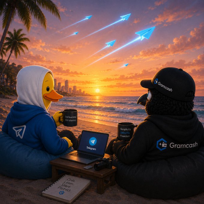 The image features two cartoon duck characters sitting at a table with laptops, cups of coffee, and books. One character has a cup of coffee while the other one has a book open next to them. The background shows an ocean view with a sunset in the distance. The caption "Gram morning fam" suggests that this scene is related to a post about Grammash or a similar platform where people can share ideas and collaborate on projects, possibly during their morning coffee breaks.