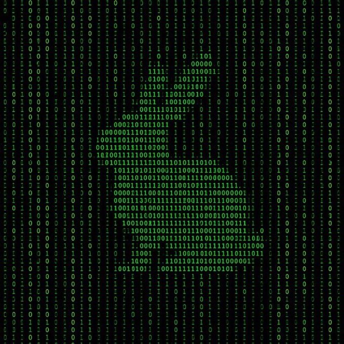 A 'Matrix'-style digital rain effect in green against a black background, with the cascading numbers and characters forming the silhouette of a skull or face pattern.