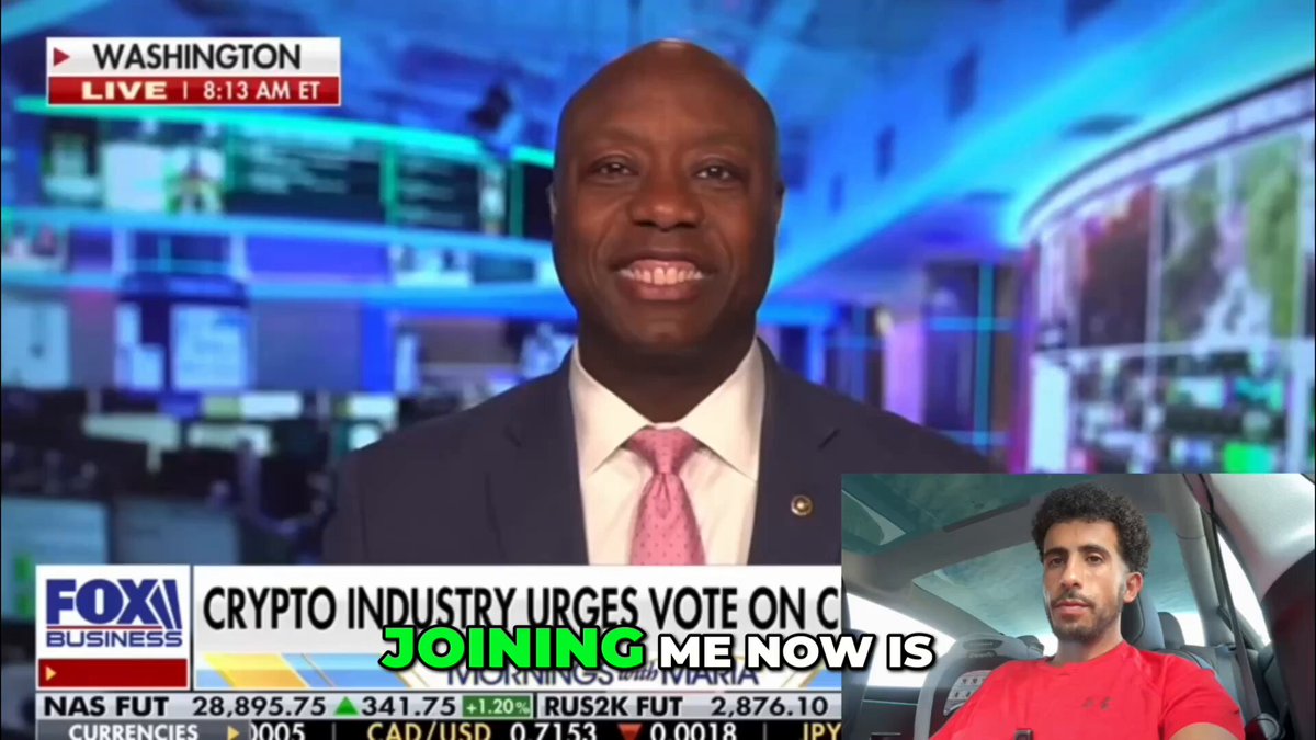 The image shows a news broadcast with two people in suits, one being a man sitting at his desk while watching the news, another man who appears to be giving a speech or making an announcement about something related to Bitcoin. The scene takes place in Washington D.C., as indicated by the text on the screen that says "Washington". There is also an image of a green circle with the words "JOINING ME NOW". This suggests a possible event or discussion taking place, possibly involving Bitcoin and its implications for the U.S. economy or financial markets.