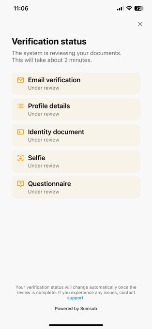 The image shows a phone screen with an app called "Verification Status" displayed, which appears to be used for verifying identity documents or personal information. The text on the screen provides instructions on how to use the app, including options such as changing the verification status and reviewing the results of the verification process.