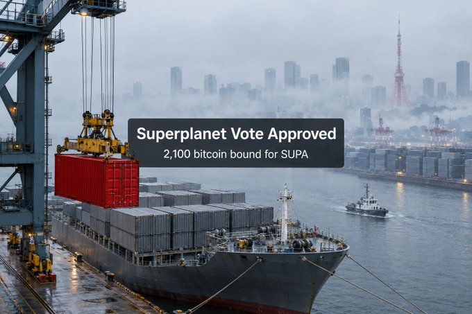 A cargo ship loaded with shipping containers sits in a foggy harbor with a city skyline and tower in the background, with text overlay reading 'Superplanet Vote Approved' and '2,100 bitcoin bound for SUPA'.