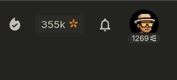 A dark-themed interface displays a flame icon, '355k' with a flower emoji, a bell notification icon, and a user profile wearing a hat with '1269' beneath it.
