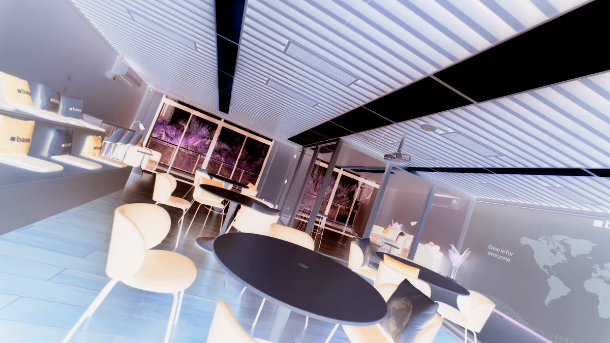 The image shows a modern restaurant with white chairs and tables arranged around a central dining table. The restaurant has large windows that allow natural light into the space, creating an inviting atmosphere for diners. A map of Asia can be seen on one wall, possibly indicating the location or theme of the restaurant. The post also mentions "a new chapter in @base in Asia" and "@ns", which could suggest a partnership between the restaurant and a specific project or initiative related to sustainable building practices or innovative design concepts.