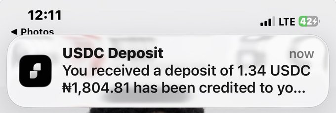 A mobile notification showing 'USDC Deposit' indicating 'You received a deposit of 1.34 USDC ₦1,804.81 has been credited to yo...'