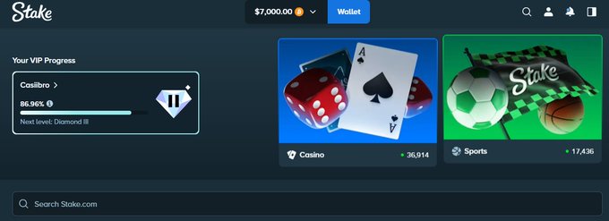 The image features an advertisement for a casino game called "Stake", with several images of dice, balls, and cards displayed within the game's interface. The background of the image has a dark brown hue. Below this section, there are two lines of text in a lighter shade that provide information about the game and its prizes: one stating "Your VIP progress" and the other saying "Wager". On the right side of the screen, an additional image showcases a soccer ball alongside a bunch of sports balls displayed on the website. The post suggests that players can drop money into the game to participate in a special promotion where they win free tickets for watching and receiving their prize cards if they reach a certain amount.