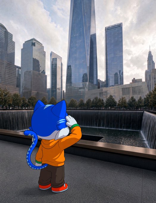 An illustrated blue anthropomorphic cat character in an orange hoodie stands looking out over a reflecting pool toward a city skyline.