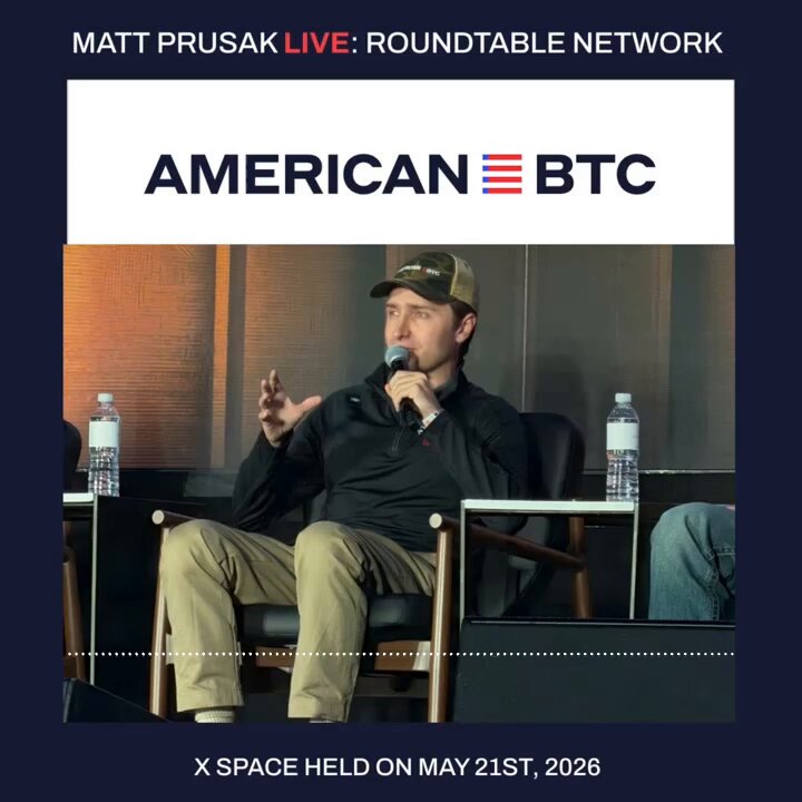 The image features a man sitting in a chair while giving a speech at an event. There are two other people sitting behind him, listening intently. In front of them, there are several water bottles placed on the table next to them. The text reads "American ABC Roundtable Network" and includes some personal information about Matt Prusak. This seems to be a promotional image for an event where Matt Prusak is speaking about Bitcoin's impact on the global economy.