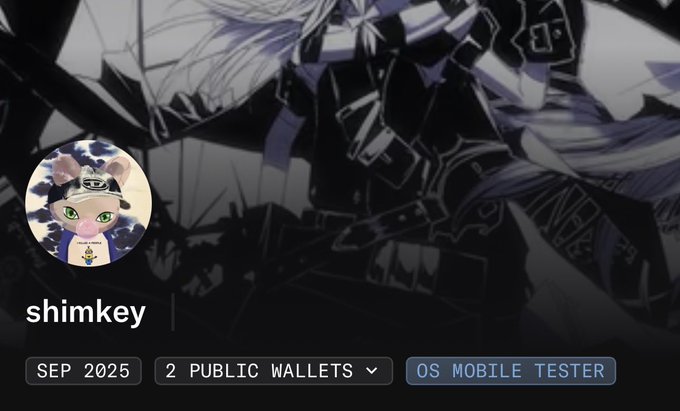 A profile card for user 'shimkey' featuring a cartoon animal avatar in a police uniform, with tags showing 'SEP 2025', '2 PUBLIC WALLETS', and 'OS MOBILE TESTER' against an anime-style background.
