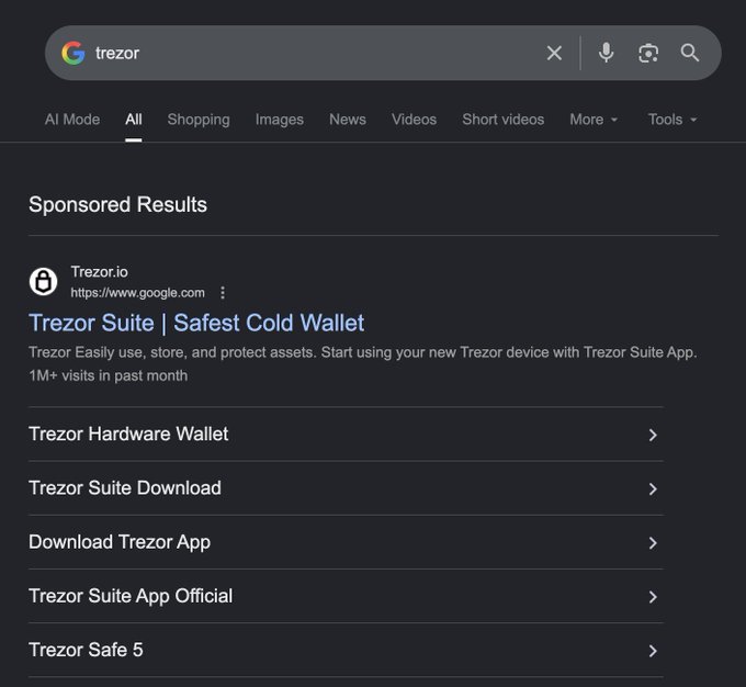 A Google search for "trezor" shows a sponsored result at the top labeled "Trezor Suite | Safest Cold Wallet" from Trezor.io (https://www.google.com), which the post identifies as a phishing site that has since been taken down.