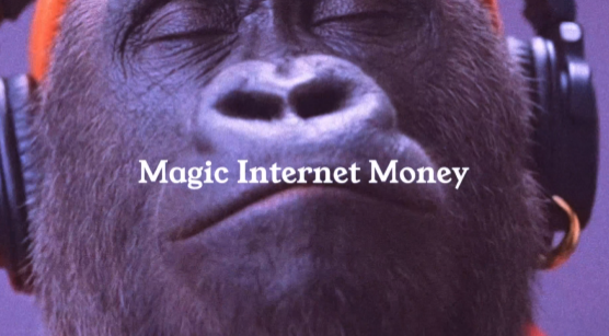 A close-up photo of a content-looking monkey wearing headphones appears with the overlaid white text "Magic Internet Money," which humorously references the crypto airdrop being discussed.