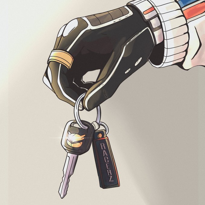 urn of a hand holding a keychain with "Ranger" and "Keyz" tags, set against a white background.