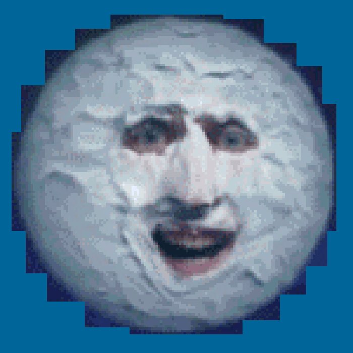 The image features a face made out of frosting, giving it an anthropomorphic appearance. The frosted face has a large nose and mouth, making it look like a person with facial expressions. The background color of the image is blue, which contrasts nicely with the white frosty face. There are no texts or other objects in the image, and the focus is solely on the frosted face and its features.