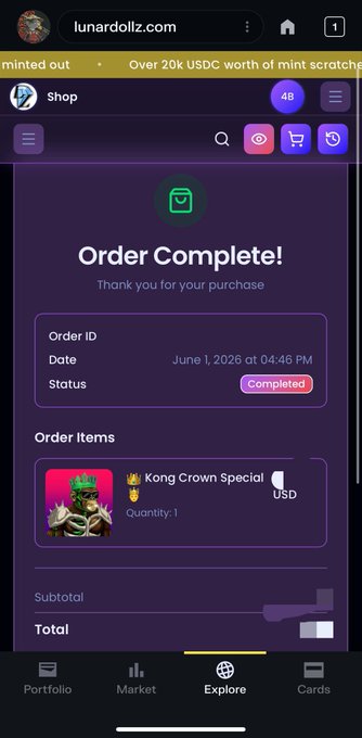 The image shows a phone screen displaying an app called LunardollzNft, which appears to be a cryptocurrency trading platform. The app has a purple background with white text that reads "Order Complete!" and "Order ID Date: June 26th at 4:48 PM". There is also a list of items on the screen, including a picture of a person wearing a crown and the words "Kong Crown Special" in the bottom right corner. The app's description suggests it is focused on cryptocurrency trading and has been ordered by LunardollzNft users for a total cost of 20 USDC.