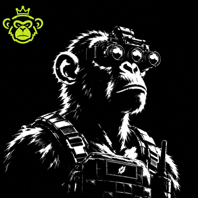 A high-contrast black and white illustration shows a chimpanzee wearing tactical night-vision goggles and military gear, with a green crowned monkey logo in the upper left corner.