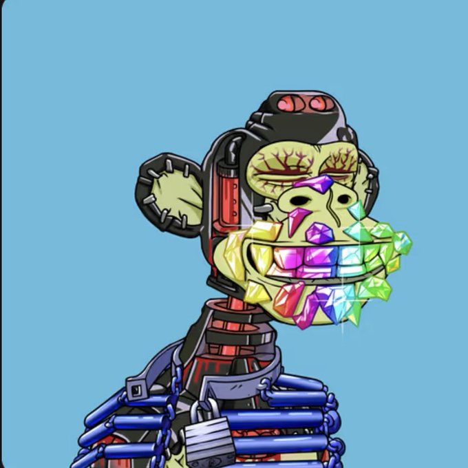 A cartoon NFT-style illustration of a cyborg/robotic ape character with exposed mechanical skull, covered in colorful rainbow gemstones on its face, set against a light blue background.