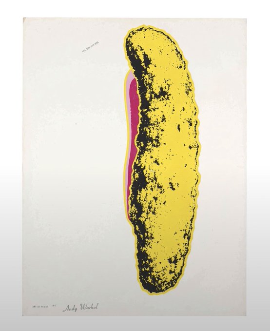 An Andy Warhol-style pop art print featuring a yellow and black textured pickle shape with a pink interior, labeled 'Andy Warhol' at the bottom.