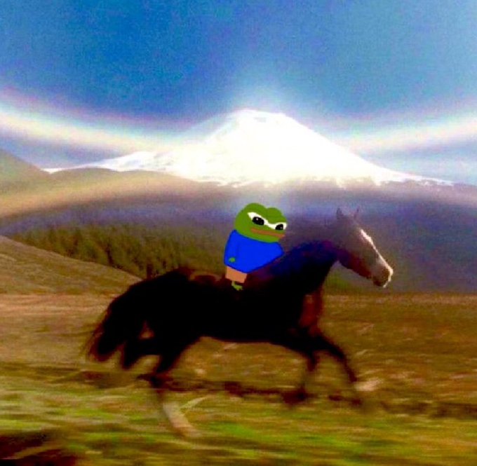 A humorous image of Pepe the Frog riding a galloping horse through a field with a snow-capped mountain and rainbow in the background.