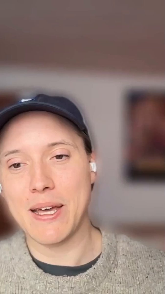 The image features a woman wearing a gray sweater with white earbuds, suggesting that she might be engaged in an online conversation or video call. The caption of the image reads "First it was internet money Then machines paying each other is cyberpunk cope" which implies that the woman's thoughts are related to the concept of cryptocurrency and its impact on society.

The post also mentions a robot wallet, machine ID, and the low-altitude economy, indicating that the conversation might be about the latest developments in technology or the future of financial systems. The image captures the attention of the viewer by showing the woman's facial expression while she talks, which adds an element of interest to the overall composition.