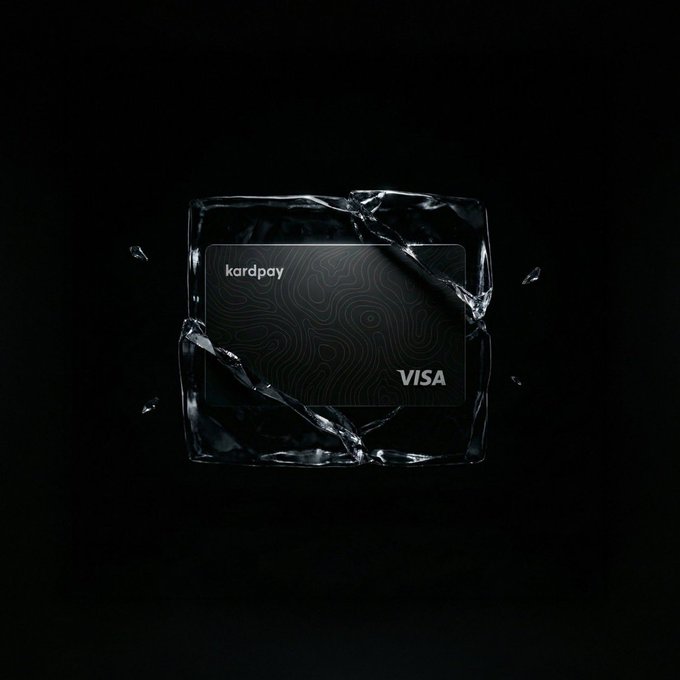 A black Kardpay Visa card encased in a cracked block of ice or glass against a dark background.