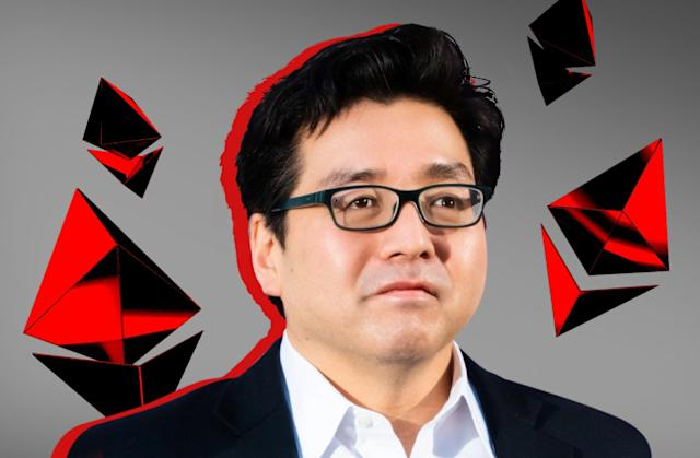 The image features a man wearing glasses, an ascot, and suit standing against a gray background with red triangles and circles scattered around him. The man appears to be looking off into space or thoughtfully gazing down at something below him. Above the man's head in the image is a text that reads "Ethereum still thinks the market is underestimating $ETH His view is simple: Ethereum'', which seems to reference his stance on the cryptocurrency market, where he firmly believes that its fundamentals are getting stronger while the price hasn't caught up yet.