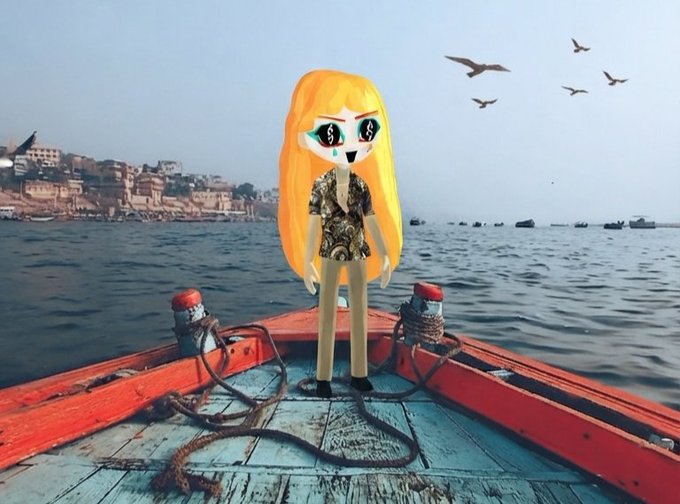 A digital overlay of a blonde cartoon girl with large green eyes stands on the bow of a red wooden boat, with a coastal city and birds in the background.