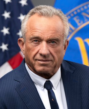 The image features a man dressed in a suit, tie, and pinstriped jacket, standing against an American flag backdrop with the words "MASSIVE" written above him. The man appears to be a well-known individual or public figure, possibly a former president or a prominent political leader. This person is also described as being involved in Bitcoin, which has become a popular digital currency over time. The post suggests that this individual has invested most of their net worth into Bitcoin and remains committed to the cryptocurrency market.