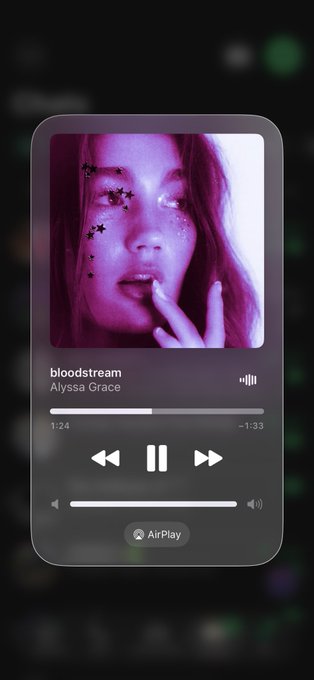 A music player interface on a phone showing the song 'bloodstream' by Alyssa Grace, with playback controls and an AirPlay option visible.