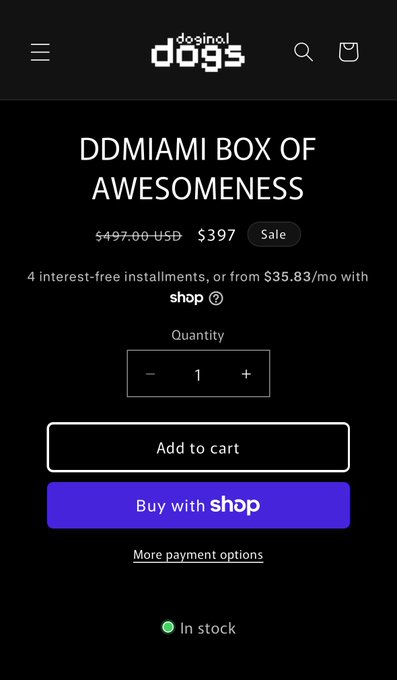 A mobile shopping page for 'doge casino' showing a product titled 'DDMIAMI BOX OF AWESOMENESS' on sale for $397 (originally $497.00 USD), with 'Add to cart' and 'Buy with shop' buttons, marked as 'In stock'.