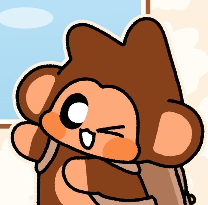A cartoon illustration of a brown bear-like character with big ears, blushing cheeks, winking, and showing a toothy smile.