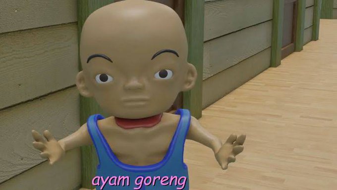 A 3D animated scene shows a bald, big-headed character in a blue tank top with the text 'ayam goreng' displayed at the bottom.