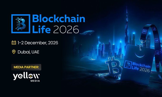 Promotional graphic for Blockchain Life 2026, a crypto industry conference scheduled for 1–2 December 2026 in Dubai, UAE, featuring Yellow Media as a media partner alongside a stylized futuristic cityscape, Bitcoin symbol, and event badge. The image aligns with the post's announcement by visually highlighting the partnership between Yellow Media and the Blockchain Life forum while promoting the Dubai event with a partner code for attendees.