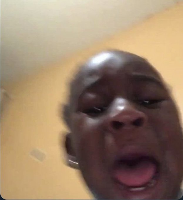 The image shows a close-up of a person's face with a distressed and seemingly pleading expression. This captures the relatable humor of the post where the user has already spent the money they were asked to return.