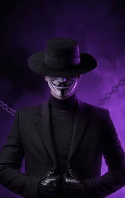 A figure in a wide-brimmed black hat, suit, and Guy Fawkes mask stands against a smoky purple background, evoking an anonymous, secretive atmosphere that mirrors the clandestine "Pi Core Team Backstage" intelligence about the Protocol 27 launch and September 15 lock date.