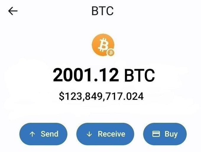 A screenshot of a Bitcoin (BTC) wallet shows a balance of 2001.12 BTC valued at $123,849,719,024, with Send, Receive, and Buy options, promoting the tweet's claim that $650 will be sent to those who share their BTC addresses—a classic crypto scam that is not actually feasible given the massive balance displayed.