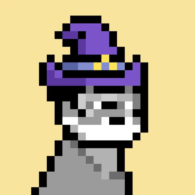 A piece of pixel art depicting a skull-like face wearing a large purple witch hat with a blue band and yellow buckle, set against a plain tan background.