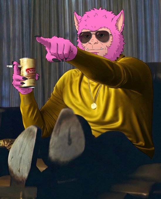 An edited photo featuring a pink monkey mask (resembling Majin Buu) and pink hand overlay on a man in a yellow sweater holding a beer can, with his feet propped up.