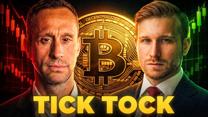 A YouTube thumbnail featuring two men in suits flanking a large Bitcoin emblem, with "TICK TOCK" in bold yellow text at the bottom, set against red and green candlestick charts. The "Tick Tock" text visually emphasizes the urgency of the post's warning that a Bitcoin push to $70K could be derailed by the Federal Reserve, with the two hosts (including @JSeyff) set to discuss it live at 9 AM EST.