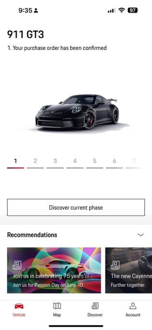 A smartphone screenshot of a Porsche purchase confirmation page for a '911 GT3', displaying the message '1. Your purchase order has been confirmed' along with a progress tracker currently on step 1, and a 'Recommendations' section showing a 'Passion Day on June 10' banner.
