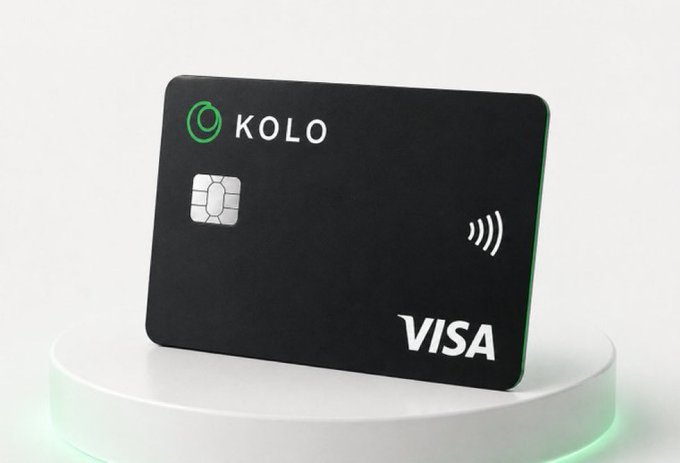 ikola.com Visa card, black with green text and logo on the front.