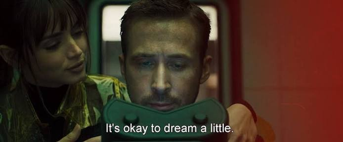 A woman leans closely behind a man as he looks down at a green visor or headset, with the subtitle "It's okay to dream a little" displayed at the bottom of the frame. The image's dreamy, aspirational tone visually reinforces the post's discussion of HYPE token emissions and the "community" allocation of 76.2% as envisioned by HyperliquidX.