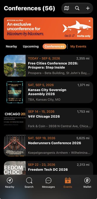 A mobile app screenshot showing a 'Conferences (56)' events list with an 'BITCOIN ALPNA' banner promoting an exclusive unconference Oct 15-17, along with listings for 'Free Cities Conference 2026: Prospera: Step Inside' in St John's Bay and other bitcoin-related events.
