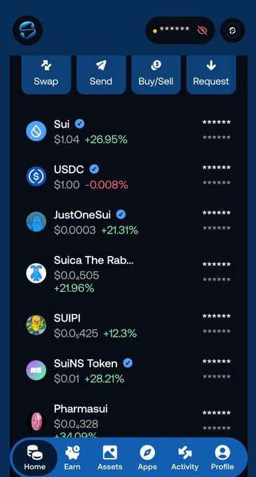A mobile crypto wallet screen showing tokens like Sui ($1.04, +26.95%), USDC, JustOneSui, Suica The Rabbit, SUIPI, SuiNS Token, and Pharmasui.
