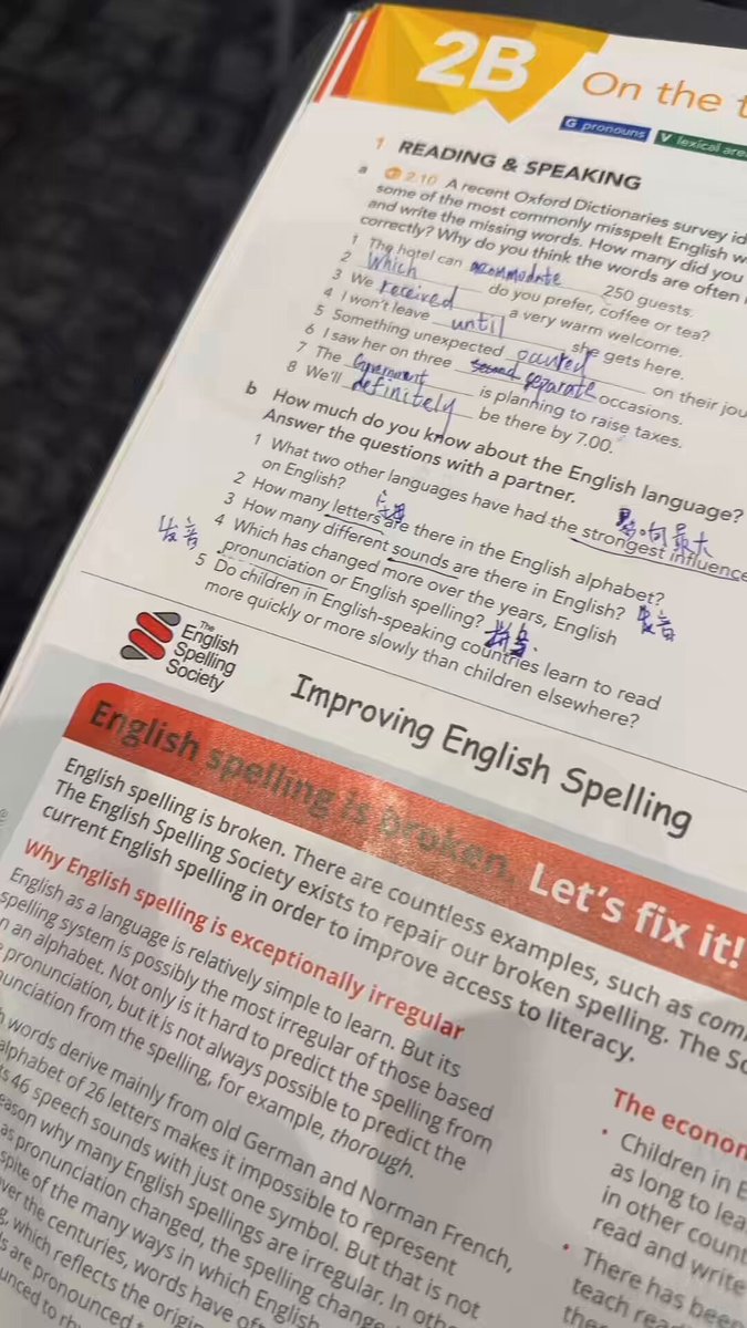 The image shows a book with writing exercises for improving English spelling, specifically focusing on the Chinese language. The book appears to be a guide or workbook designed to help users practice their spelling skills.