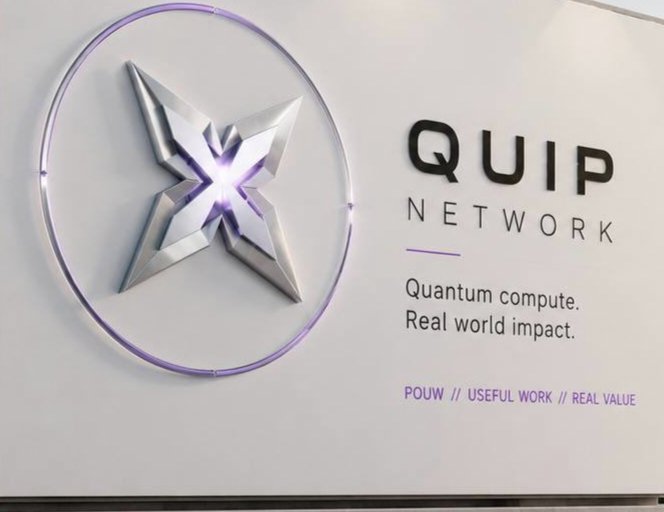 A wall sign for 'QUIP NETWORK' featuring a glowing purple X-shaped logo and the tagline 'Quantum compute. Real world impact.' with 'POUW // USEFUL WORK // REAL VALUE'.