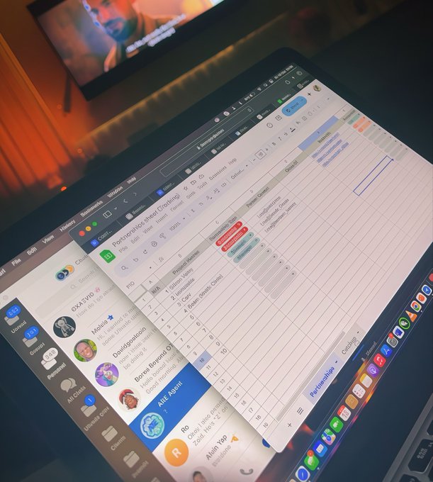 A laptop screen displaying a Telegram chat window alongside a spreadsheet titled 'Picternalloor new: Eroebling' with football game data and a matchup list.
