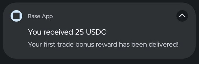 A notification from Base App stating 'You received 25 USDC' as a first trade bonus reward.