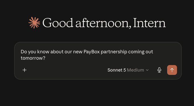 The image shows a dark-themed Claude AI chat interface with the greeting "Good afternoon, Intern" alongside a user's typed question asking, "Do you know about our new PayBox partnership coming out tomorrow?"—ironically illustrating the accompanying post's point that even Claude AI is unaware of the unreleased partnership announcement.