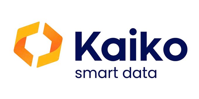 The image displays the Kaiko logo featuring a geometric orange and yellow hexagonal design alongside the text "Kaiko smart data" in dark blue. The logo corresponds to the Paris-based crypto market data company that recently raised $110 million in a funding round led by S&P Global.