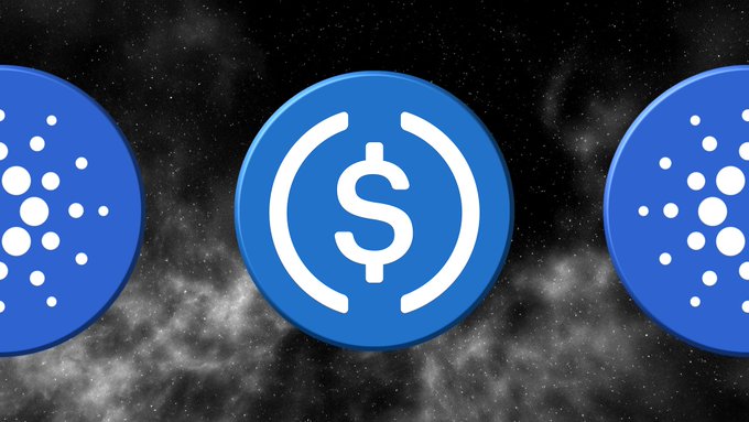 A blue USDC (USD Coin) cryptocurrency logo flanked by two Cardano (ADA) blue logos against a starry black space background.
